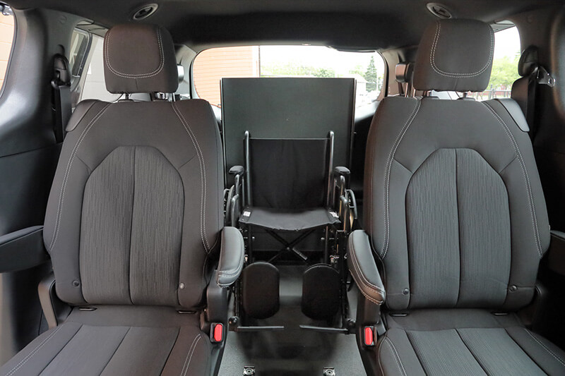 Flex Series with 2 seats in middle, two rear seats folder with wheelchair in back